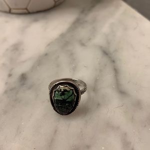 Sterling silver ring- hand made from a metal smith . Has stamping on side